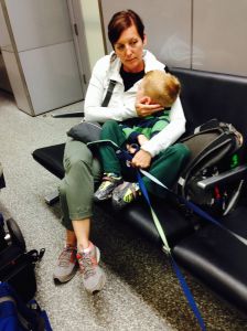 Sleepy family members getting ready for a very late flight into our future.