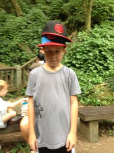 Griffin had lent Bo one of his "cool hats" for the hike but they had a minor falling out at the waterfall so he decided two hats are better than one.
